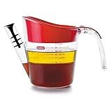 Esta jarra separa cuidadosamente la grasa de su salsa de asado.