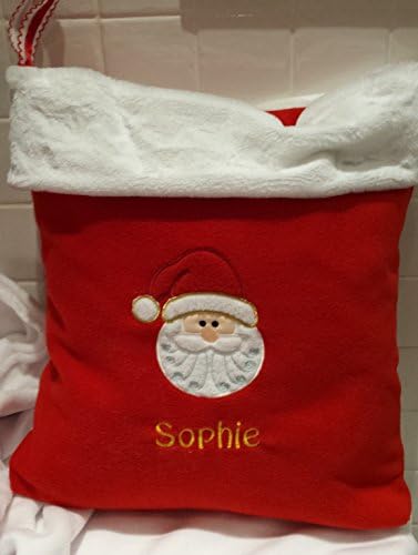 Handmade Personalised Christmas Santa Sack / Reindeer Sack. Embroidered with childs name and your choice of Reindeer face or Santa face. The sack is made from beautiful bright red fleece, with soft white trim and comes with a hanging loop. A beautiful quality item.