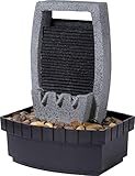 Dieser schöne Springbrunnen besticht durch das Wasserfall Design in Stein-Optik mit Dekosteinen, ein perfekter, harmonischer Hingucker für drinnen