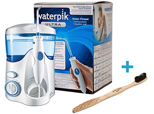 Waterpik 100 Ultra - Irrigador dental. 10 niveles de potencia, deposito 600 mililitros. Compartimiento para guardar las boquillas. Incluye un cepillo de Bambú Bio White.