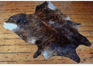 Cowhide Rug - 160 by 150 cm, a medium brown brindle hide