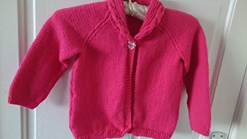 Katie - rose pink, hand knitted, long sleeved, girls round neck cardigan with cabled collar and ribbon button fastening. Age 4 - 5 years.