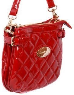 Red quilted patent mini handbag with two zip up sections by Claudia Canova
