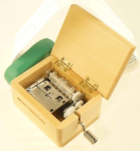 Spieluhr mit Lochstreifen, Gehäuse aus Holz – natur mit Locher für eigene Kompositionen und 3 Melodiestreifen - 3