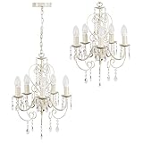Y los decorativos ornamentos de esta lámpara 'chandelier' son gotas acrílicas transparentes