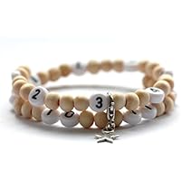 Bracelet d'allaitement avec des perles en bois de couleur neutre