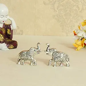 Handicrafts Paradise Carved Aluminium Metal Elephant Showpiece (7.65 cm x 2.55 cm x 6.3 cm, Set of 2)