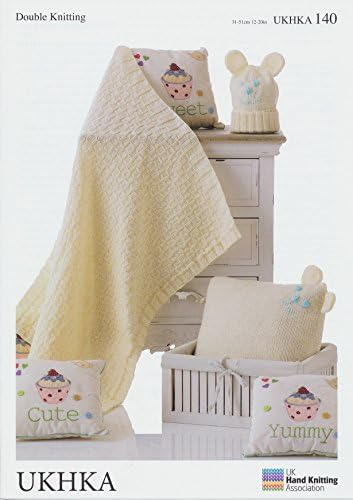 Double Knitting Pattern - Baby Blanket, Cushion & Hat In Cream (UKHKA 140)
