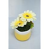 Ovales Tischgesteck mit gelben künstlichen Blumen