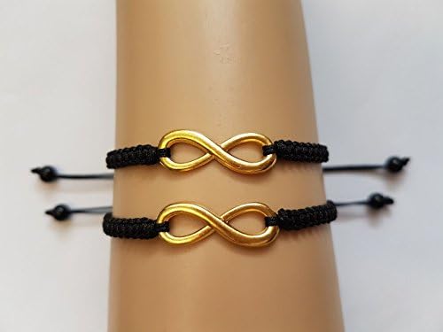 Couples gold coloured infinity bracelets