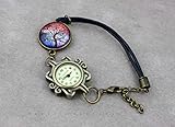 Armbanduhr mit Lederband in dunkelblau, mit Baum Motiv