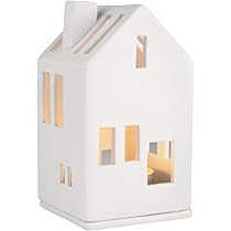 Maison Lumineuse Räder Design Avec Cheminée Dorée – Décoration Intérieure élégante Pour Toutes Les Saisons