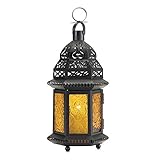 Estos farolillos para velas constan de un patrón de marco de metal con paneles de cristal exterior decorativa en los lados.