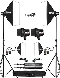 Sonia 300D Studio Flash Light Strobe pack of 2 Strobe Light 300D; 2 SoftBox 60 x 60 cm; 2 Radio Trigger AT16; 2 AC Power Cord 5 Mtr; 2 Synchro Cord 5 Meter; 2 Light Stand 8.5 ft approx; 1 Light Stand Bag (Not Meant For Video Shoot)