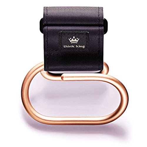Jumbo Swirly - Gancho para cochecito de bebé, color negro y dorado