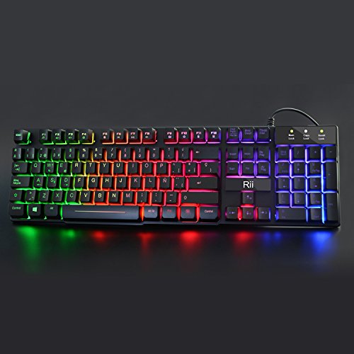 Rii RK100  Gaming Teclado Retroiluminado con 5 colores arco iris  Tacto mec  nico y alta sensibilidad  Con cable  Color negro  Teclado Espa  ol 