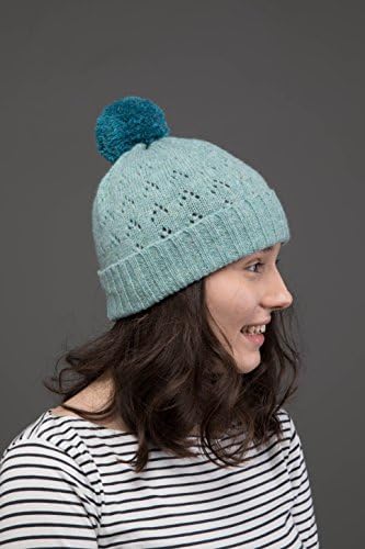 Knitted pastel green beanie hat with blue pom pom, unisex hat