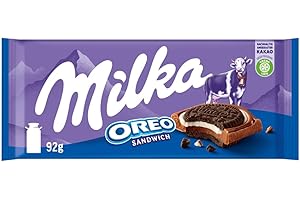 ‎MILKA Milka Oreo Sandwich – Alpenmilch-Schokolade gefüllt mit knusprigen Oreo-Keks-Stückchen und feiner Vanillecrème – 92g