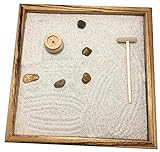 Incluye un rastrillo de madera natural, arena calibrada y 5 piedras.