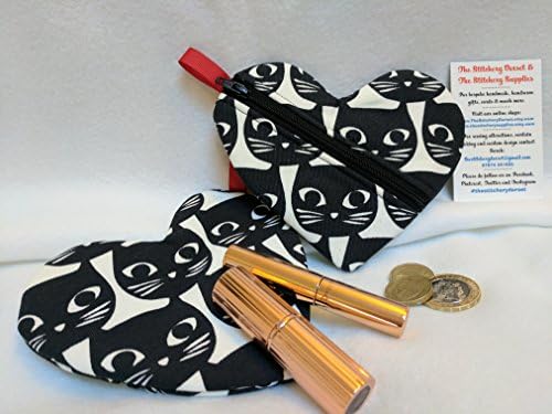 Heart Shaped Zip up Purse. Handmade zip up purse made using a lovely Black Cat print on a white background. Great stocking filler / valentines gift / mothers day gift etc. Perfect to use to carry money / small cosmetic items (lipstick, eyeshadow) / keys etc. Perfect gift for a child or adult.