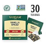 Ingredientes: esta bolsita de té contiene té negro mezclado con canela, clavo, cardamomo, pimienta negra y extractos de capuchino y vainilla. Estas hojas de té son de color marrón negruzco y están bien enrolladas. Esta mezcla especial presenta una nota envolvente de vainilla junto con sutiles toques de especias aromáticas. Claramente leñoso y terroso, el licor se siente amplio en la boca.