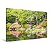 Produktbild Calvendo Premium Textil-Leinwand 120 cm x 80 cm Quer, Eine Steinlaterne, die in keinem Japanischen Garten Fehlen darf in Einer prächtig blühenden Gartenanlage Japanischer Garten, Japan Kunst Kunst