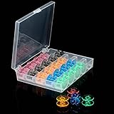 Color: varios colores. Caja con 25 canillas vacías para máquina de coser (plástico), varios colores