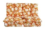 Color floral naranja y crema, tanto para los cojines como para el techo.