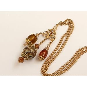 Halskette mit drei Anhängern in braun gold