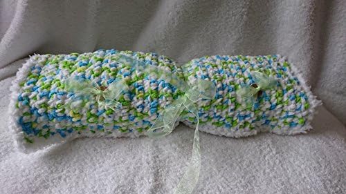 Cute as a button - handmade chunky crochet baby blanket in white with turquoise and green spot. Suitable for either baby boy or baby girl. Will fit car seat, pushchair, carrycot, moses basket or crib.