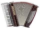 Besonders präzise, leichtgängige Diskantmechanik mit Holztastatur und Perlmuttauflage, besonders weite Mensur, großer Perlmutt-Luftknopf, großvolumiges Basscassotto für satten Basssound