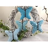 4 Stoff-Schmetterlinge in türkis/weiß Tönen