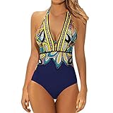 La parte de abajo a cintura alta, con la parte delantera fruncida, que disimula la barriguita de maravilla. Estilo retro muy logrado dando un toque elegante al bikini.