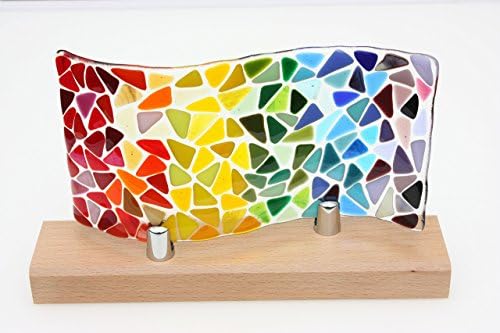 Fused Glass Rainbow Wave, a piece of glass art mounted on a beech wood base for windowsill or a candle screen