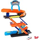 Hot Wheels City oyuncak araba ve pist seti, D&ouml;n&uuml;şt&uuml;r&uuml;lebilir Maceraya Başlangı&ccedil; Garajı oyun seti, 1:64 &ouml;l&ccedil;ekli metal ara&ccedil;, 10