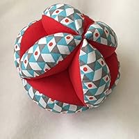 Balle de préhension Montessori "imprimé bleu, gris, fond rouge"
