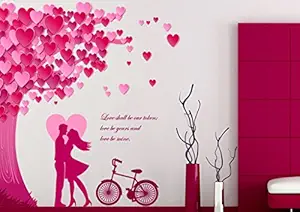 Decals Design Romantic Couple Under The Heart Leaves Tree and Love Quote with Bicycle Wall Sticker (PVC Vinyl, 90 cm x 60 cm, Multicolour)