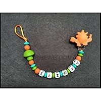 Attache tétine / attache sucette personnalisée Garçon 100% silicone (champignon et dinosaure)