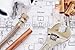 Produktbild Poster-Bild 110 x 70 cm: "Plumbing Tools Arranged On House Plans", Bild auf Poster
