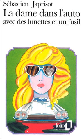 DAME DANS L'AUTO AVEC DES LUNETTES ET UN FUSIL [LA]