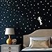Fluorescent fairy / elf and 130 glow in the dark stars - wall decal for a starry sky