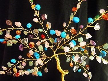 Lovely Large Mixed Crystal Gemstone Tree; approx 5in/13cms tall on Gold Coloured Wire and a Chunkly Clear Quartz Cluster Base; crystals include turquoise, amethst, aventurine, clear quartz, carnelian and rose quartz - Sold by Spiritual Gifts. Usually dispatched within 2 working days.
