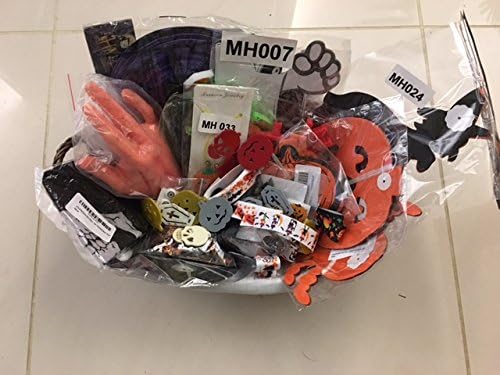 HALLOWEEN PARTY BAG FULL OF TRICK OR TREAT ITEMS INCLUDING BUNTING, LANTERN, TABLE DECORATIONS,RIBBONS,LED NECKLACE, HEADBAND AND BADGES