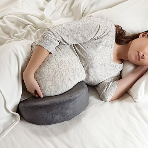 Ergonomically shaped pregnancy pillow supports a variety of positions, ideal for bed and sofa.