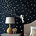 Fluorescent fairy / elf and 130 glow in the dark stars - wall decal for a starry sky