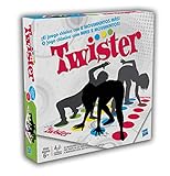 Juego de equilibrio consistente en seguir las instrucciones de la ruleta (mano derecha azul, pie izquierdo rojo) pero sin caerte
