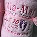 PERSONALISED PINK BLANKET WITH HOT PINK AND PURPLE EMBROIDERY. SPECIAL KEEPSAKE BABYGIFT