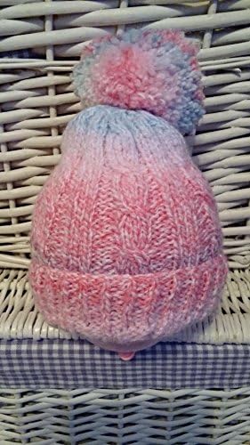 Candi - Hand knitted baby girls pom pom hat in beautiful shades of pink and blue candy striped wool.