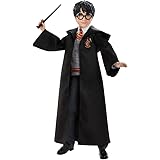Harry Potter - Harry Potter, personaggio da collezionare alto 25 cm, con uniforme di Hogwarts, morbido mantello di Grifondoro