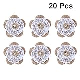 Hergestellt aus Sackleinen, Spitze und Perlen.